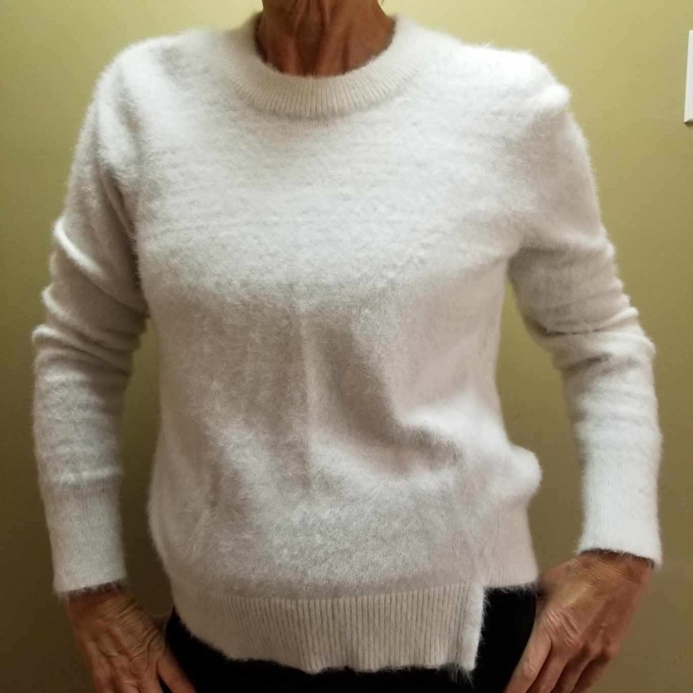 White cozy sweater.